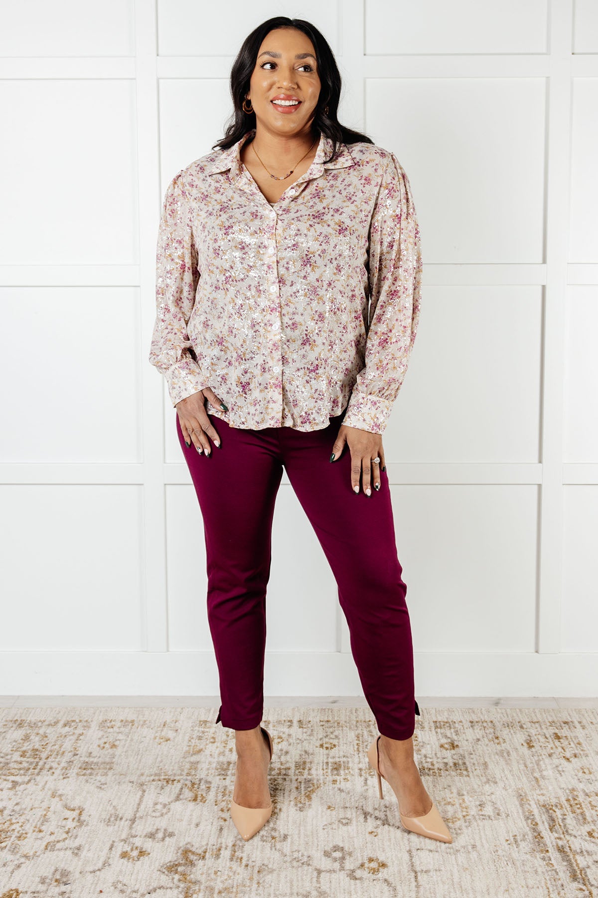 Plus size full body view of Teigan Floral Button Up Blouse styled with flowy poet sleeves and button cuffs.