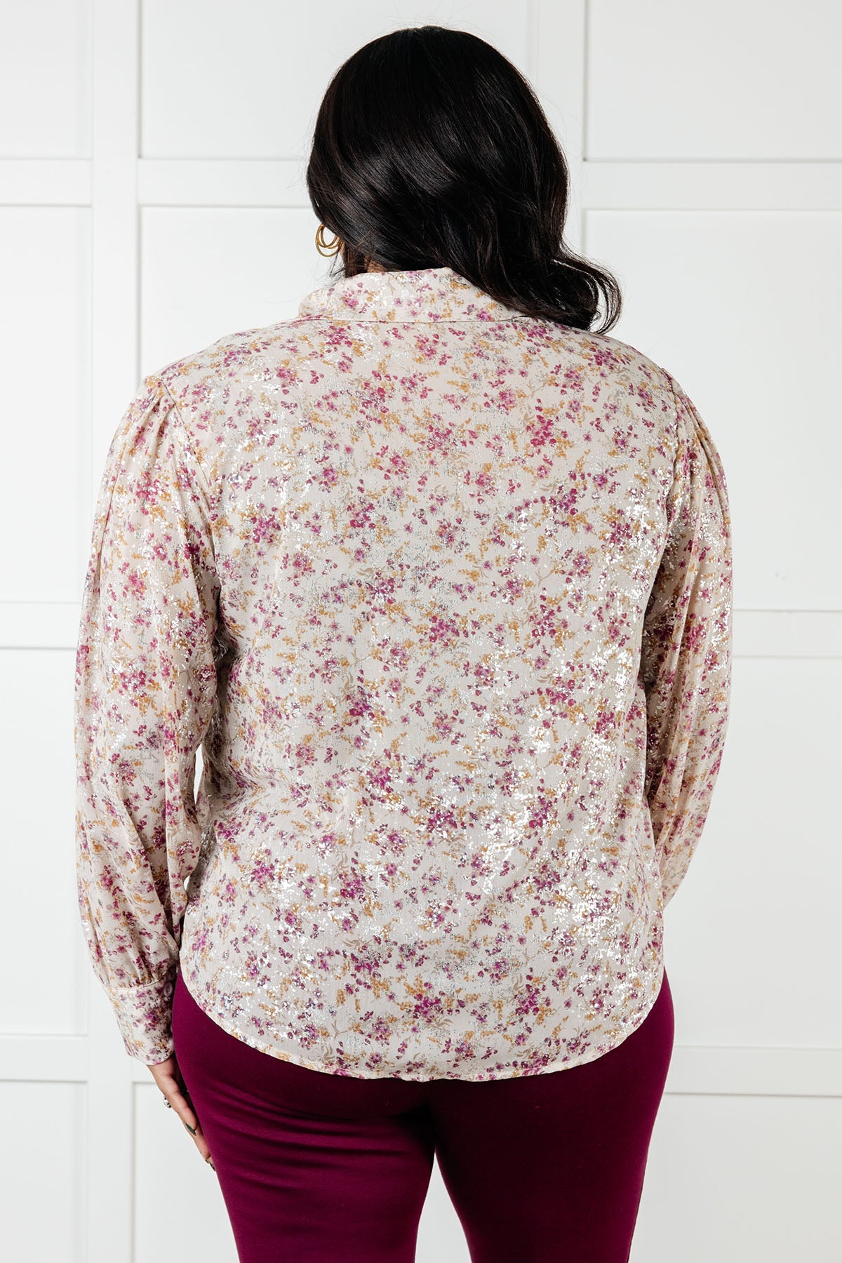 Plus size back view of Teigan Floral Button Up Blouse with relaxed fit and scooped hemline in floral chiffon.