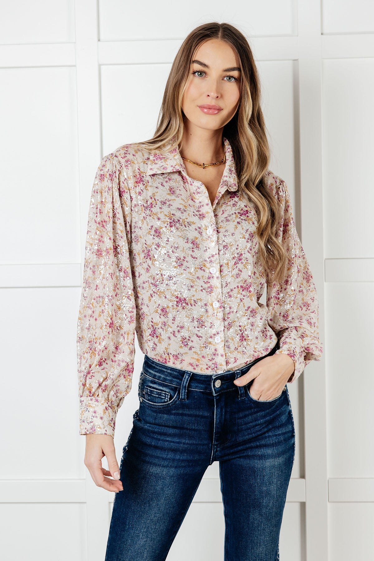 Front view of Teigan Floral Button Up Blouse with button front closure, collared neckline, and burgundy floral print.