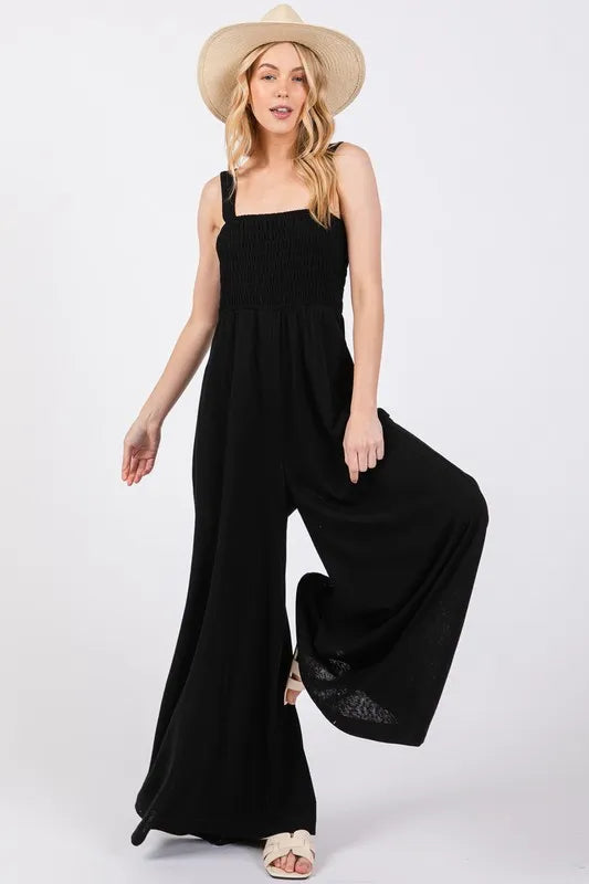 Semi-Formal Black Jumpsuit with Square Neck and Wide Legs - Ideal for a Polished, Breezy Look.