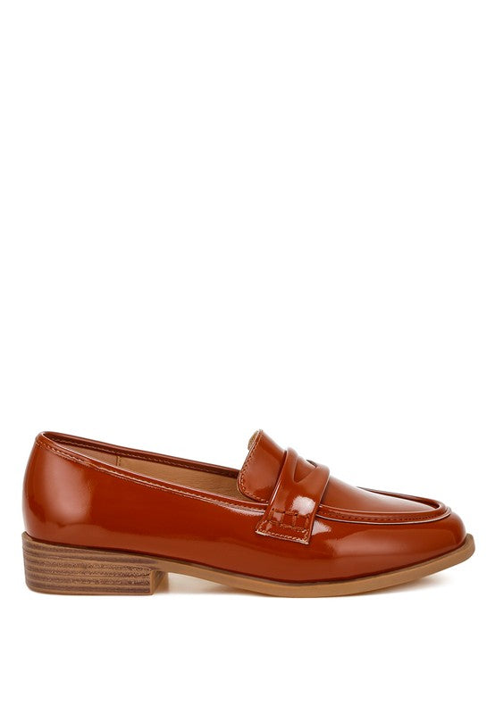 Side view of Brown Avery Patent Loafers with round toe and cushioned insole design.