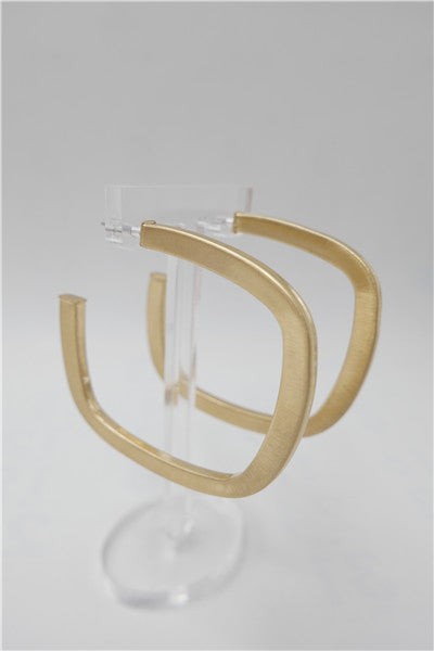 Overall Luxe Square Hoop Earrings on clear stand, gold-plated satin finish highlighting modern open square hoops.
