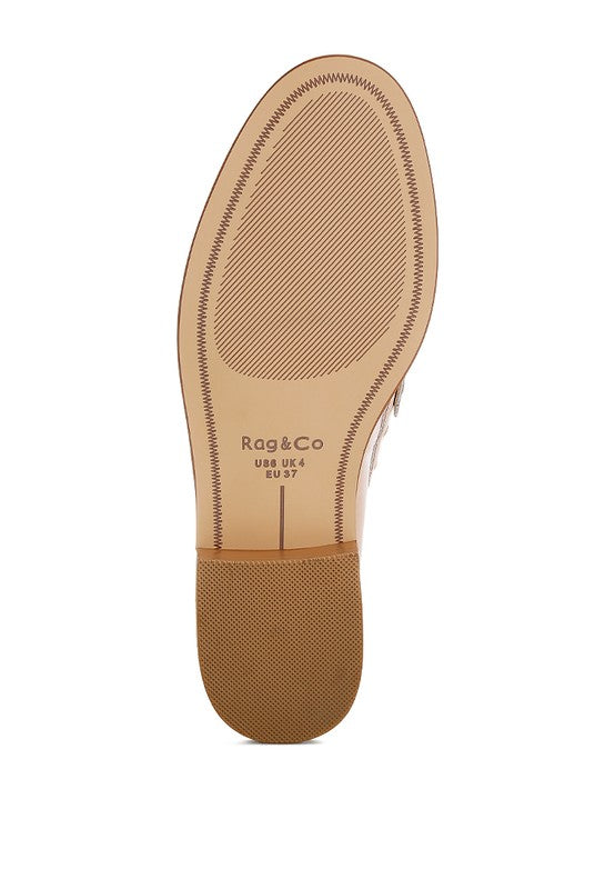Bottom view of Beige Oglavia Studded Leather Loafers with rubber sole and block heel.