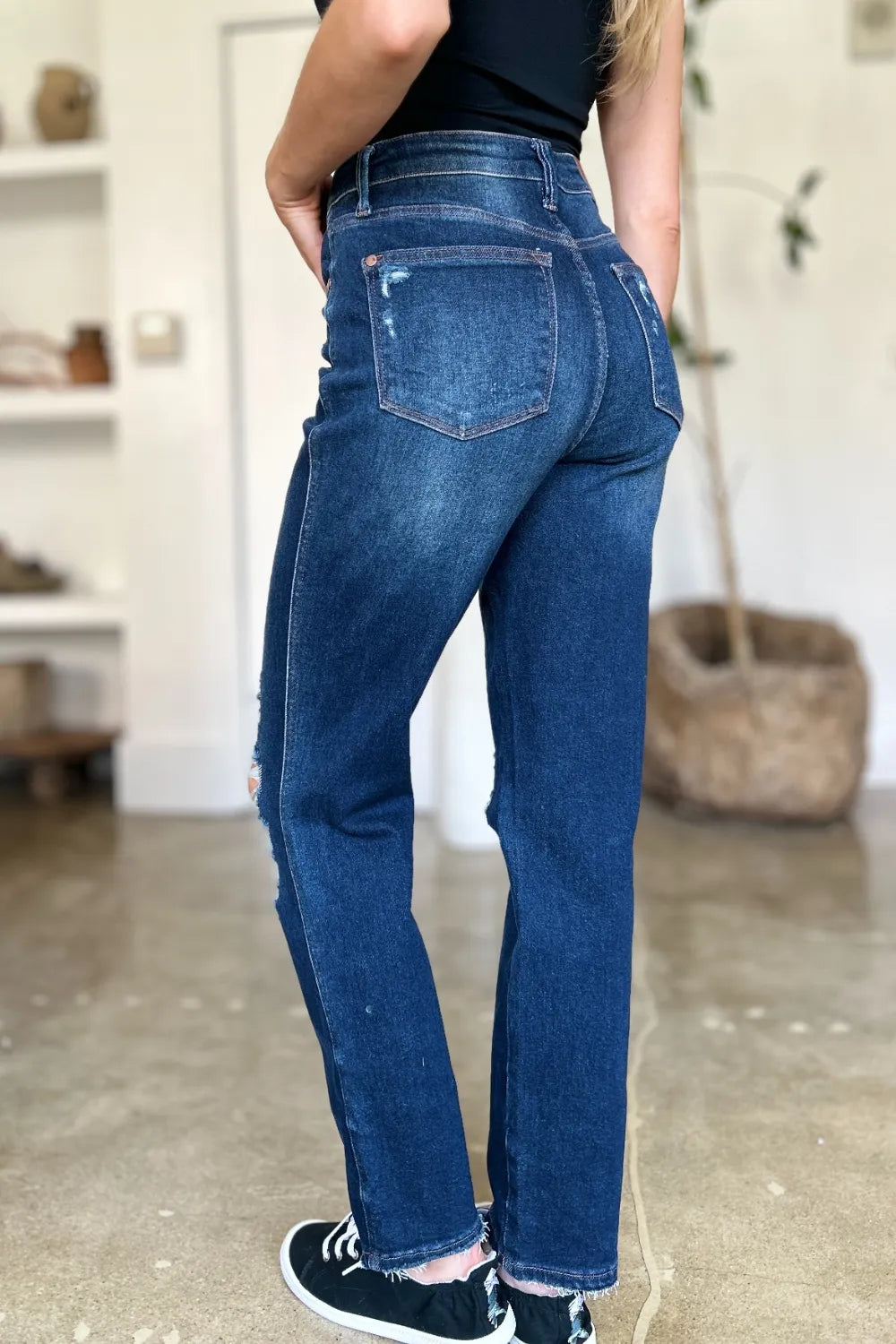 Back of Wynna Straight Jeans with heavy distressing and classic pocket detail