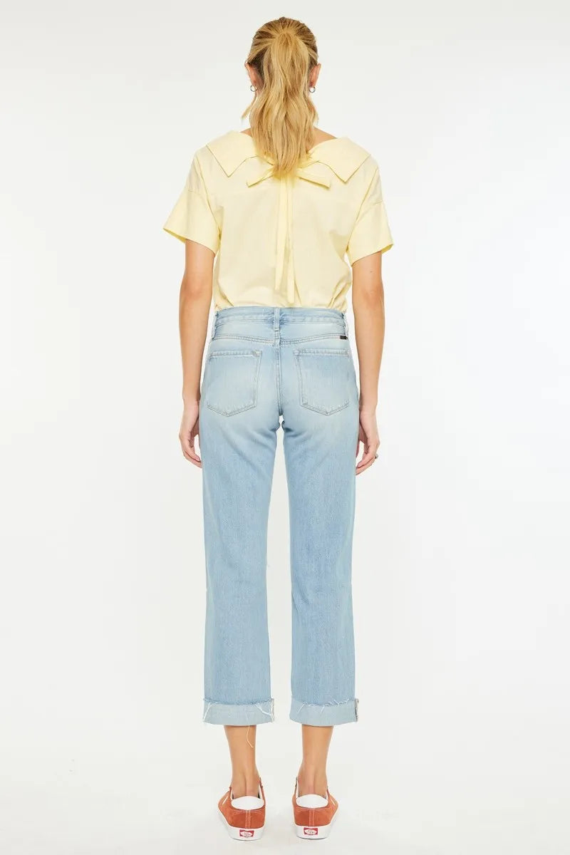 Back view of Kancan Cordelia Mid Rise Boyfriend Jeans in medium wash with classic pockets and relaxed boyfriend fit.