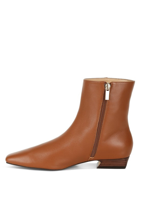 Inside view of Obita Leather Ankle Boots in tan with zipper closure and smooth leather finish.
