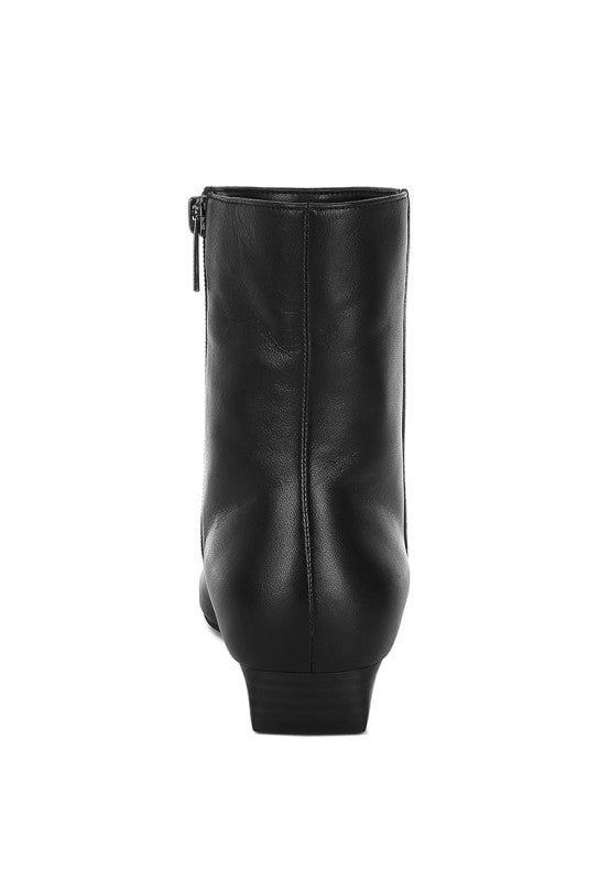 Back view of Obita Leather Ankle Boots in black showing panel detail and low block heel.