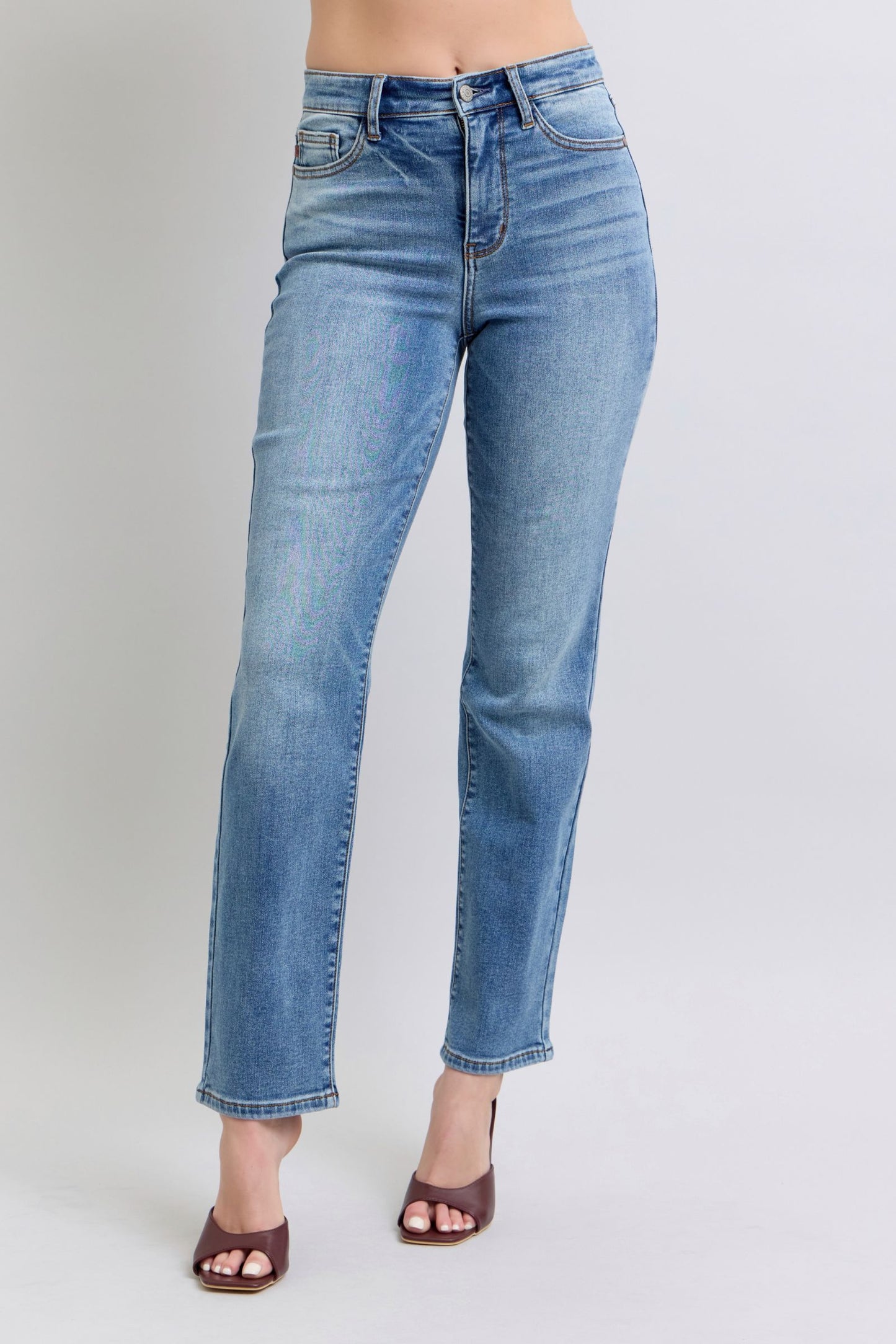 Medium wash Judy Blue straight jeans, thermal washed finish, classic fit with moderate stretch.