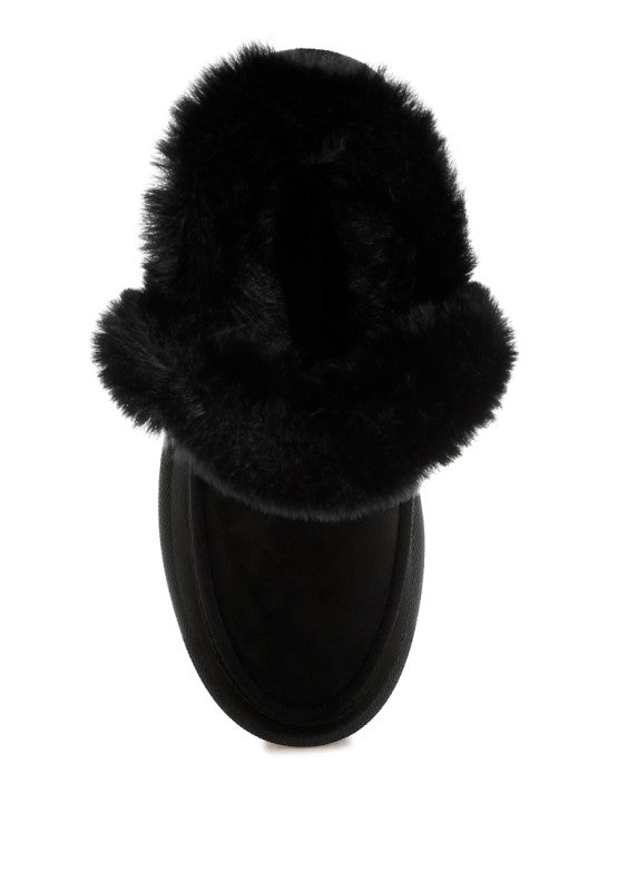 Black Linka Boots with faux fur trim, TP rubber sole, and flatform heel design.