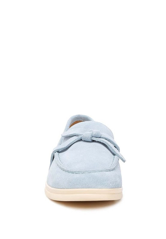 Nautica baby blue suede loafers, straight front display with knot vamp.