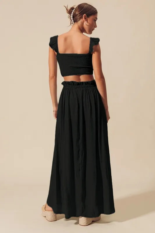 Back view of Kora Smocked Top and Flowy Black Maxi Skirt Set, featuring smocked back detail and relaxed, breezy maxi skirt fit.