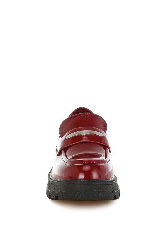 Front view of Burgundy Gleam Stride Chunky Loafers showing pointed round toe and slip-on design.