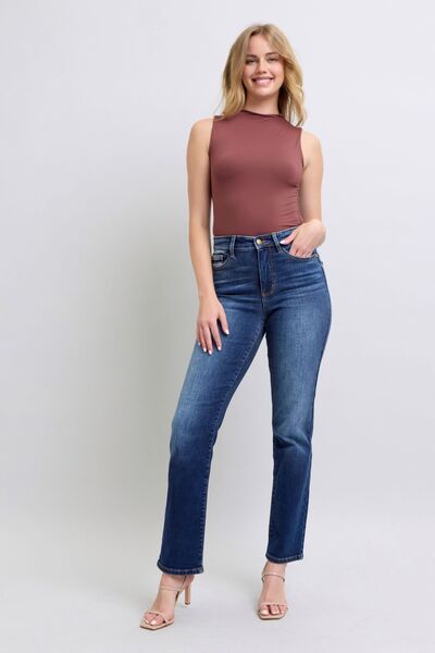 Full body view of Carson Straight Leg Jeans in dark wash, mid rise, styled with casual top.
