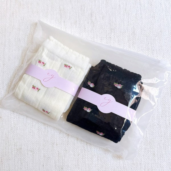 Packaged Vintage Floral Patterned Socks Set of 2 in black and white.