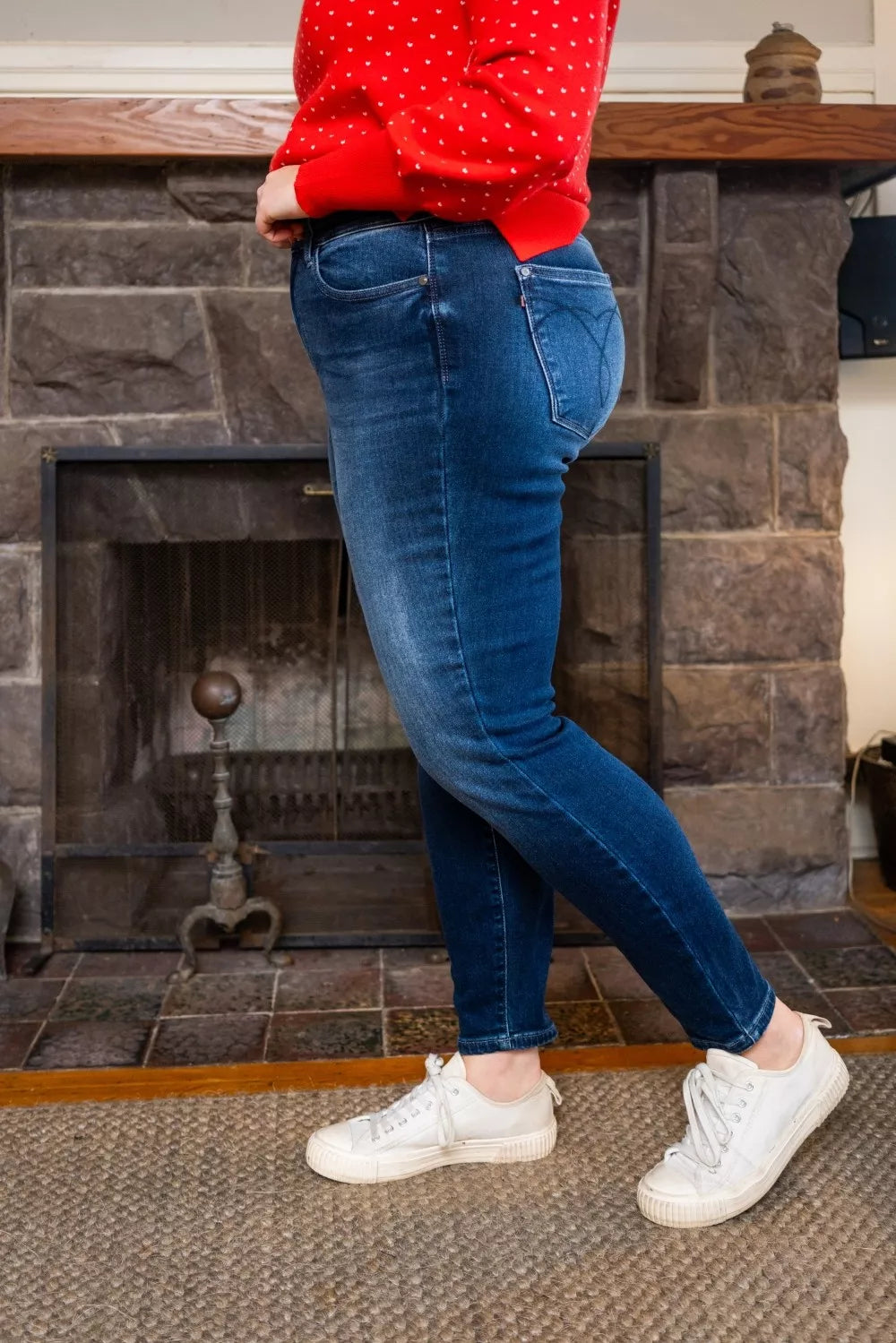 Plus size side angle of Glenda Washed Thermal Skinny Jeans highlighting thermal fabric.