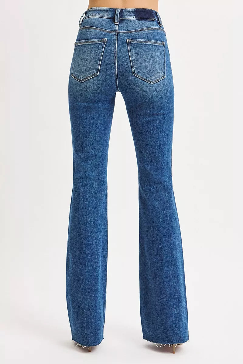 Back view Risen Seraphina dark wash flare jeans with flattering high rise fit.