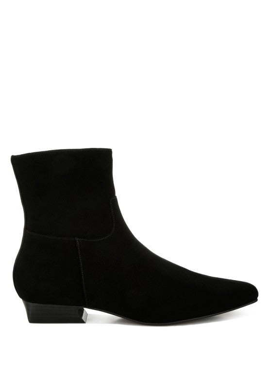 Side view of the black Hakra suede boot showcasing the closed almond toe, sleek paneling, and flared block heel.