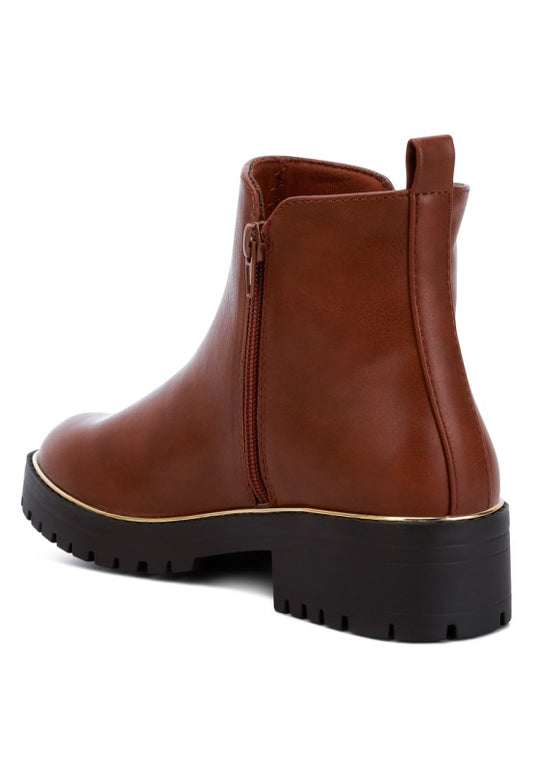 Back angle view of Tan Thorin Block Heel Boots showing pull tab, metallic detail, and block heel.