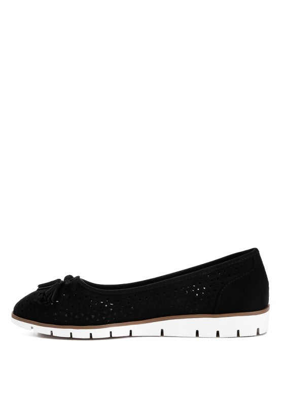 Side angle view of black Pacer vegan leather ballerina flat showcasing the perforated design, bow detail, and flat heel.