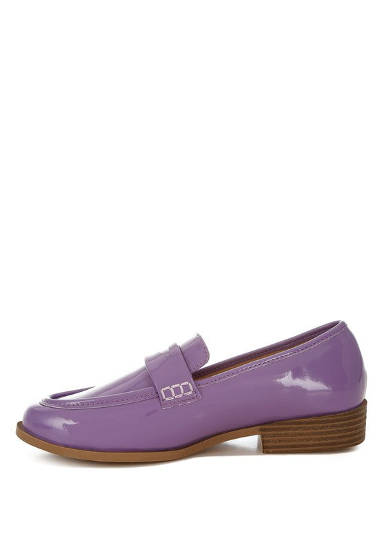 Medial view of Lilac Avery Patent Loafers with rounded toe and patent shine.