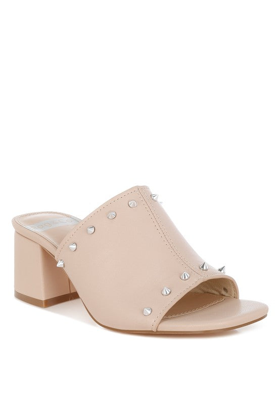 Beige Lomela Stud Embellished Block Heel Mules by Rag Company featuring stud accents, an open square toe, slip-on closure, and a 2.5-inch block heel with plush cushion insoles.