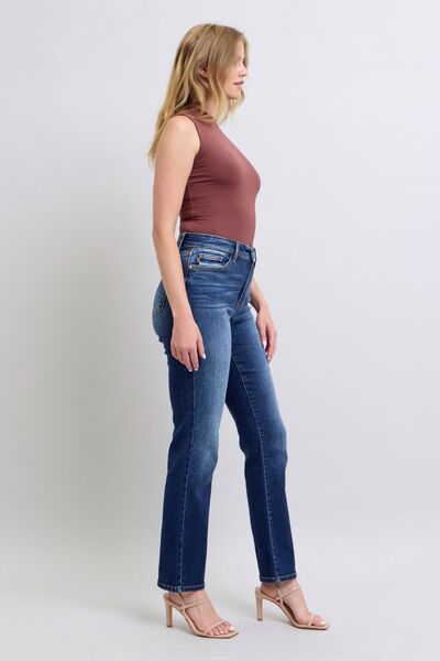 Side view of the Judy Blue Carson Washed Straight Leg Jeans in dark wash with mid-rise waist, slightly stretchy fabric, and practical pockets.