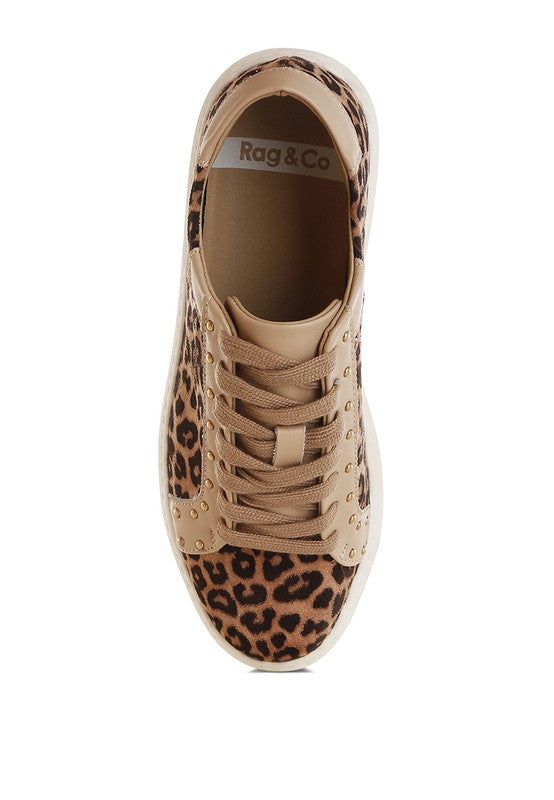 Top view of beige leopard print leather sneakers with lace-up design and studded round toe detail.