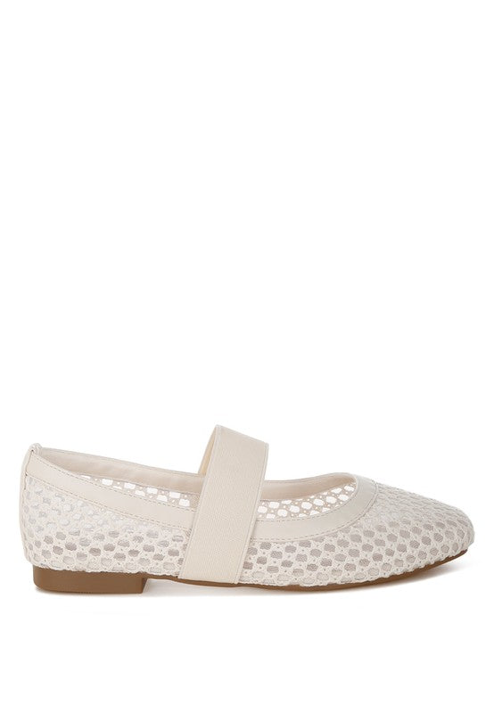 Beige Nayela Flats side profile with low flat heel and cushion insole.