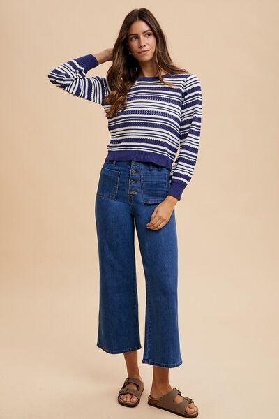 Full body shot of model wearing Frankie button fly jeans styled with casual top.