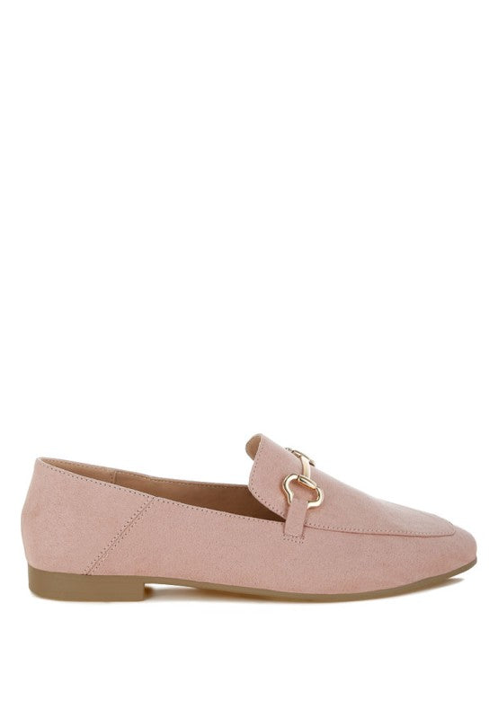 Side view of Pink Noltas Loafers highlighting sleek design, round toe, and flat heel.