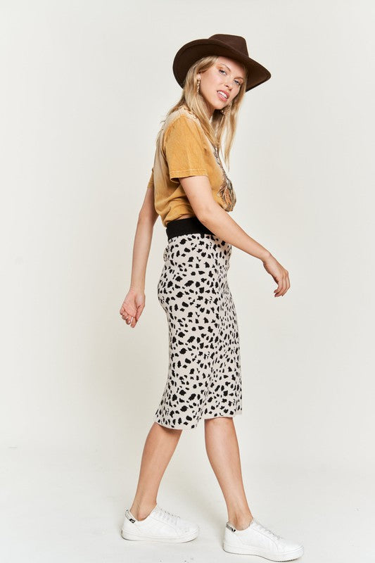 Kilah Animal Print Sweater Skirt side profile, midi length with back slit.
