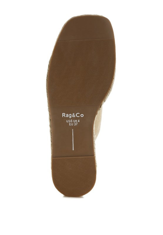 Bottom view of beige genuine leather espadrille flatform sandal showing textured TP rubber sole.