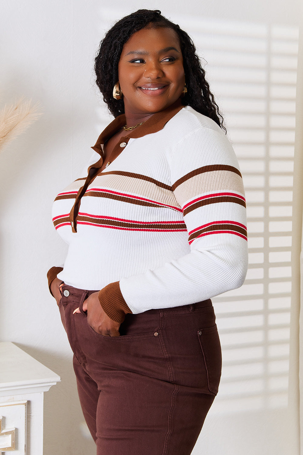 Plus size side view of Andy striped beige rib-knit collared top with long sleeves.