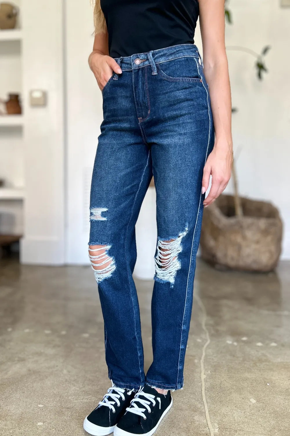 Model in Wynna Straight Jeans, styled with casual top, showing high waist fit