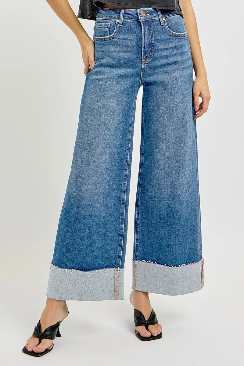 Sylvi cropped jeans featuring wide cuff, zip fly closure, and comfy tummy control waist.
