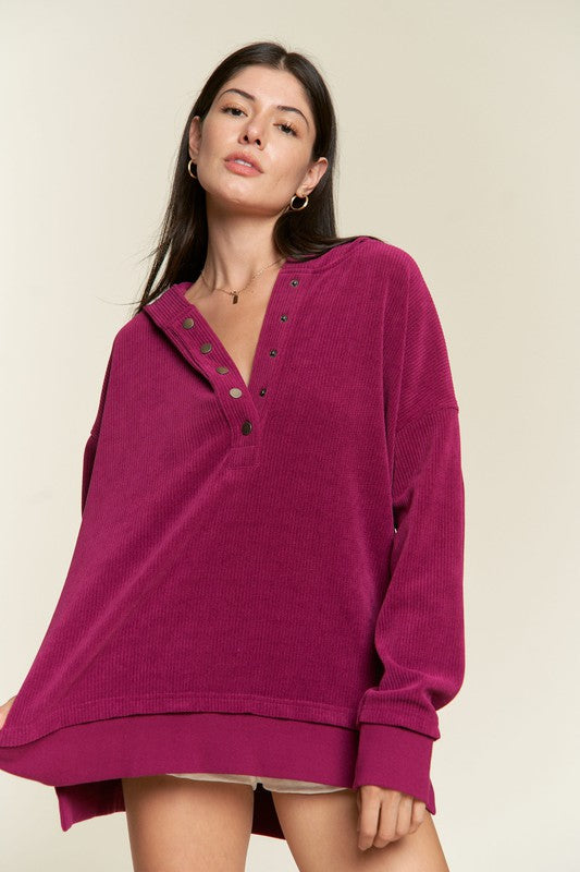 Kenzie Hooded Sweatshirt in Magenta side view showing dropped shoulder and relaxed ribbed texture.