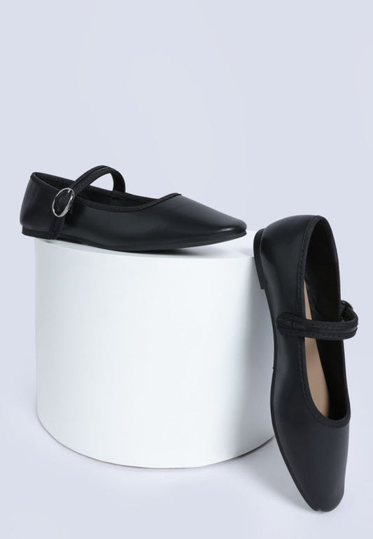 Iker ballerinas in black, pin buckle strap flats with cushioned insole.