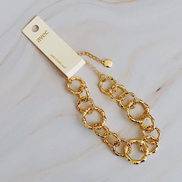 Artfully Linked Chain Bracelet packaged with Avec branded tag.