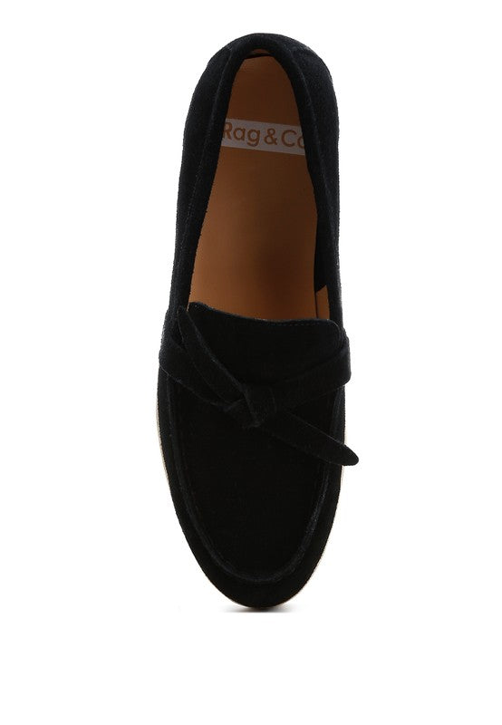 Top-down angle of Nautica black suede loafers showing knot vamp.