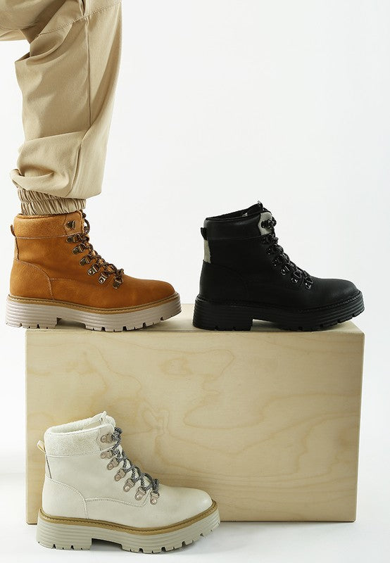 Person wearing Tan Boskoff Lace-Up Chunky Ankle Boots beside Beige and Black pairs for color comparison