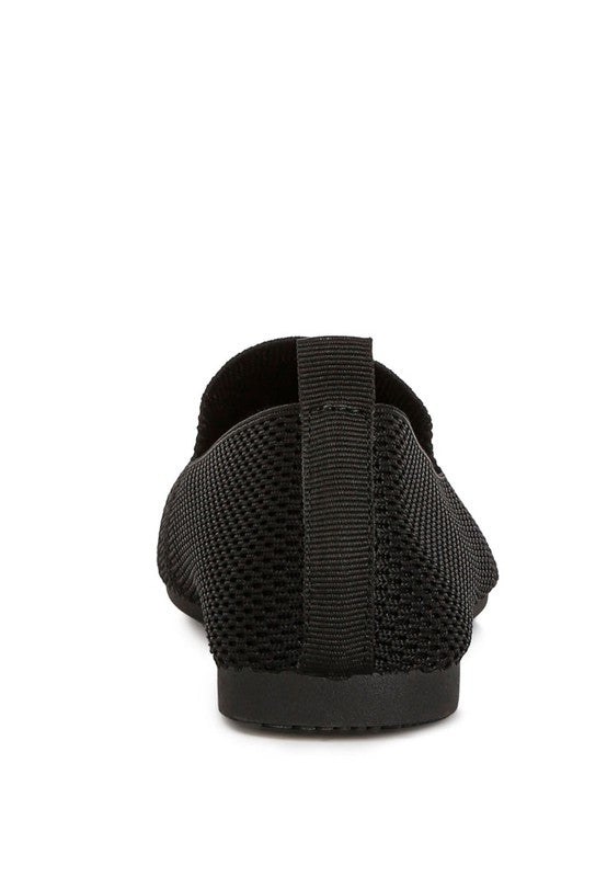Akili Knit Textile Solid Flats in black, back view highlighting pull tab