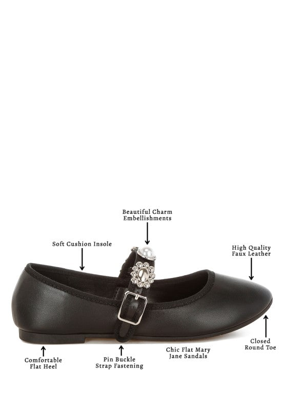 Infographic of black Kavana Mary Jane Flats displaying key features including charm embellishments, cushioned insole, round toe, flat heel, and buckle strap for a stylish and comfortable fit.