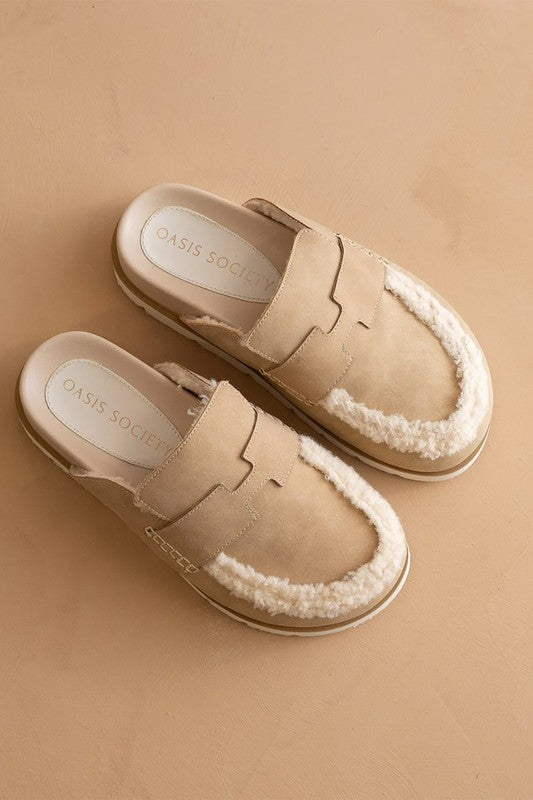 Top view of Avalon Khaki suede loafer mules highlighting plush shearling trim and slip-on opening.