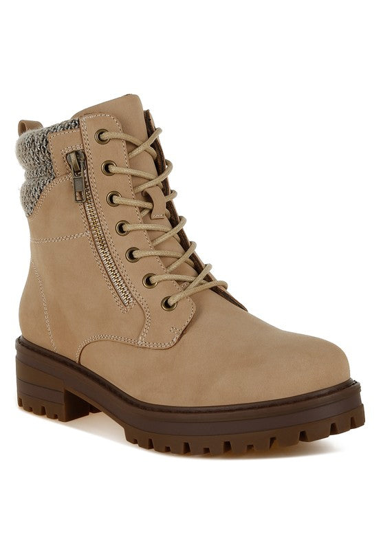 Front angle of Beige Mahisha Hiker Boots with knitted collar, lace-up front, and dual zipper detail.