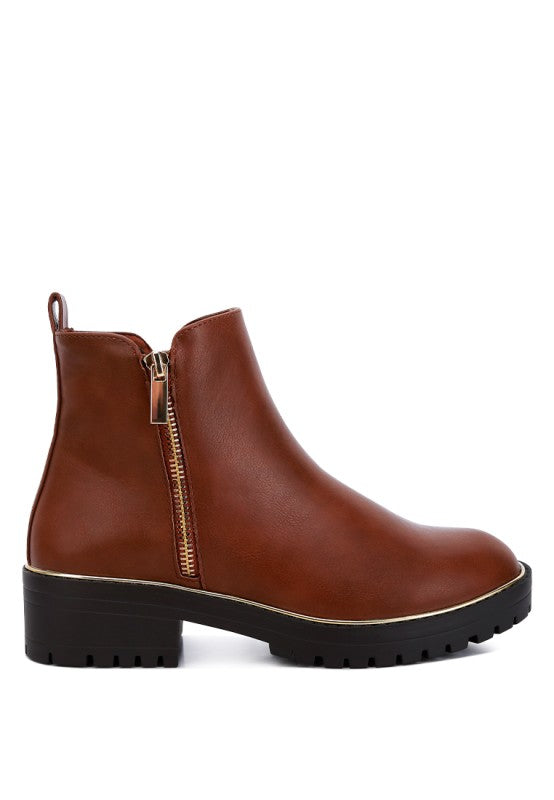 Side view of Tan Thorin Block Heel Boots with zipper closure and lug sole design