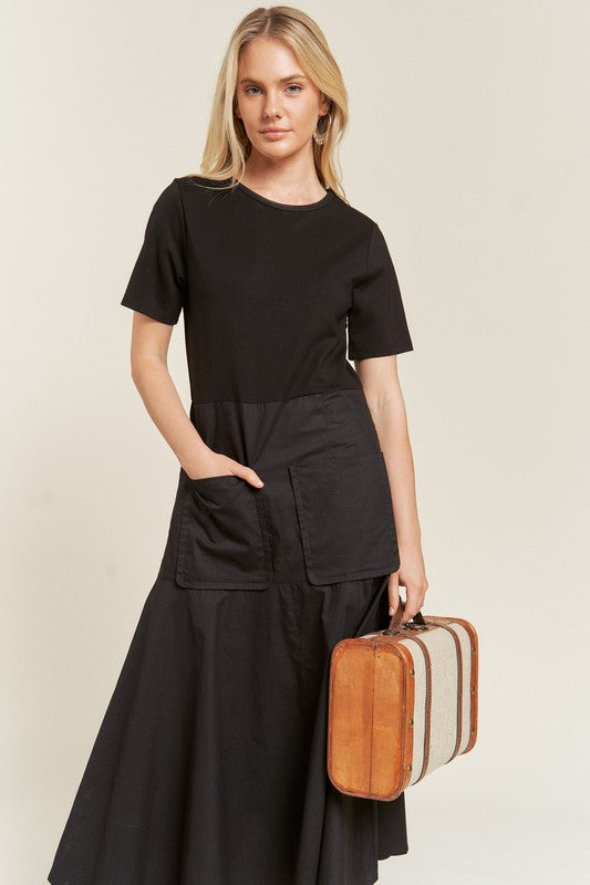 Front view of Felicity Knit Mix Dress in black highlighting large patch pockets and midi length