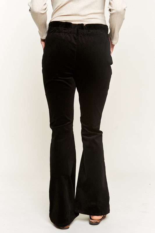 Back view of Taran Corduroy Flare Pants in black with elasticized waistband