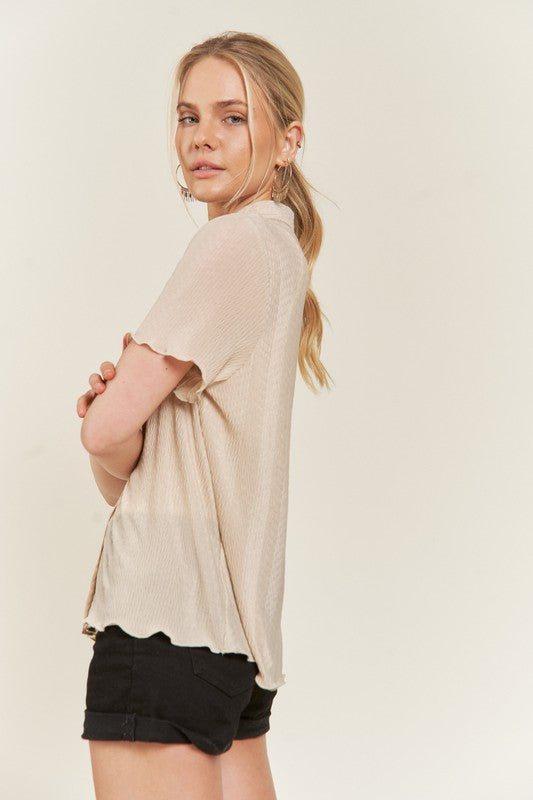 Side view taupe plus size textured shirt, button front closure.