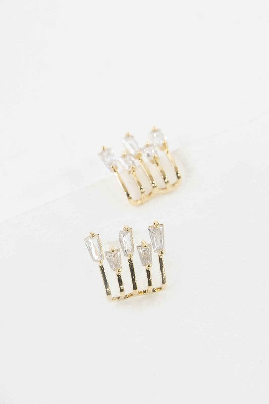 Close-up of Kalimba Gold Baguette Post Earrings featuring five baguette-cut stones in a row with a warm gold finish.