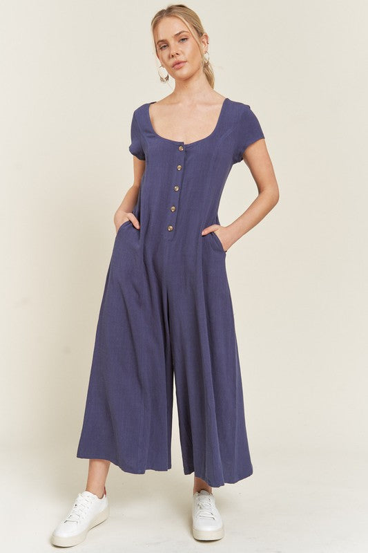 Navy Seona Linen Plus Size Jumpsuit front view with scoop neckline and short sleeves.